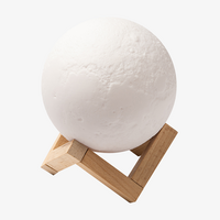 Bluetooth-Lautsprecher im Monddesign mit LED-Beleuchtung Lamnpe in Halterung