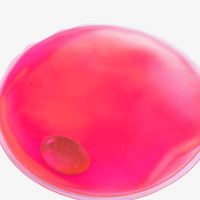 Nahaufnahme pinkes Wärmekissen in Kreisform