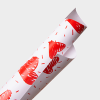 Geschenkpapier,farbig bedruckt, eingerollt