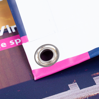 Anhängerplane, farbig bedruckt, geklappt mit Ösen und Saum