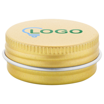 Lippenbalsam in golderner Dose bedruckt auf dem Deckel