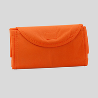 Non Woven Taschen faltbar, gefalten, orange