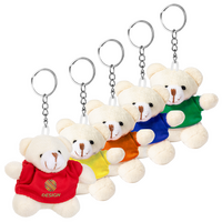 Aufreihung weißer Teddybär mit T-Shirt in verschiedenen Farben